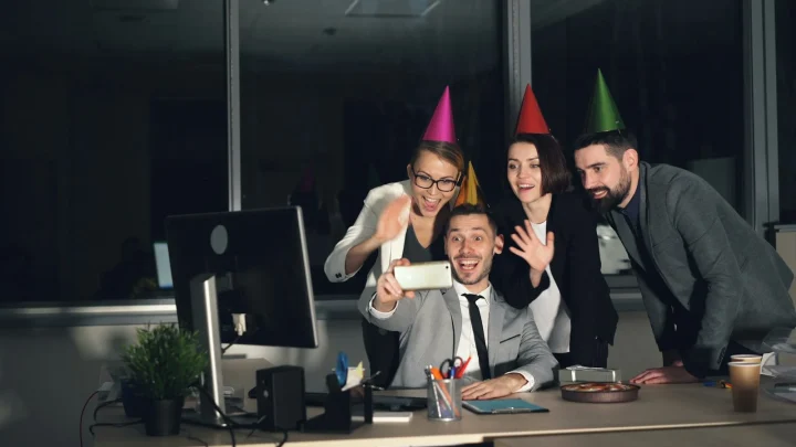 Colleagues celebrating an event at the office